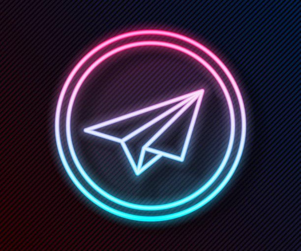 istock Glowing neon line Paper plane icon isolated on black background. Paper airplane icon. Aircraft sign. Vector Illustration 1248990173