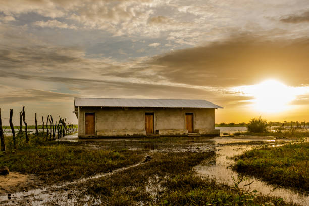 There is a village in Tana Delta, Dide Waride, that is at the bank of river tana. the river bursts its banks and overflows to the village. The sun set is epic