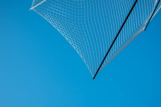 istock Net on a background of blue sky. 1248995587