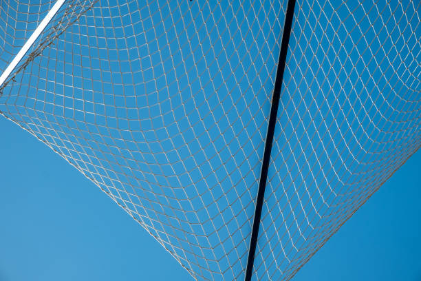istock Net on a background of blue sky. 1248995925