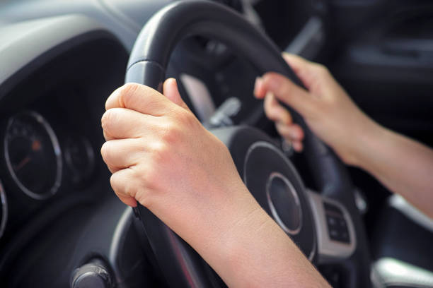 istock Woman driving a car. 1248998715