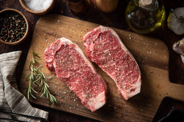 istock seasoned raw sirloin beef steak on cutting board 1248998733