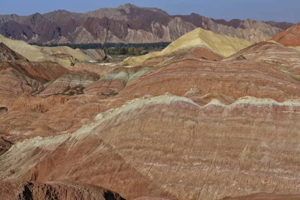 Spectacular colorful rusty sandstone and siltstone landforms of Zhangye Danxia-Red Cloud Nnal.Geological Park so called Rainbow Mountains-E.foothills of the Qilian Range. Zhangye-Gansu province-China.