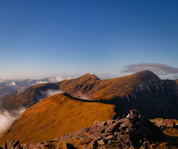 istock Mountains in sunset tones 1248999308