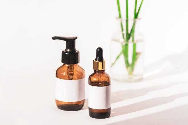 istock Beauty products: wash gel and serum unbranded packages, white background 1249001236