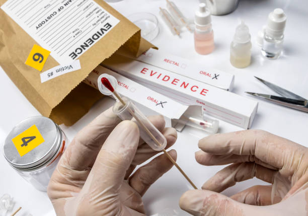 istock Hematological analysis with forensic test kit in a murder in a crime lab, conceptual image 1249002195