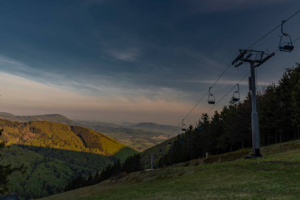 Color spring morning view from Pustevny in Beskydy fresh mountains with cable car