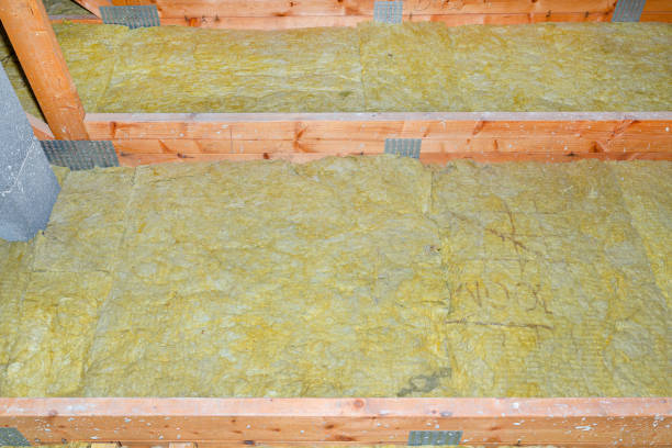 istock Ceiling and attic floor insulation made of rock wool between the trusses. 1249003801