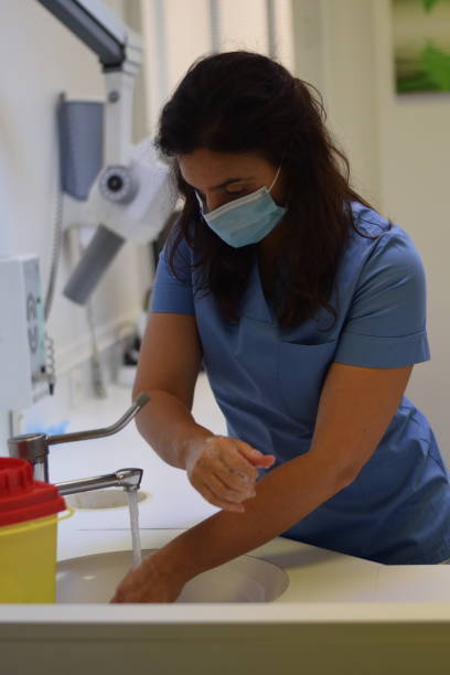 istock A female doctor washing hands 1249005875