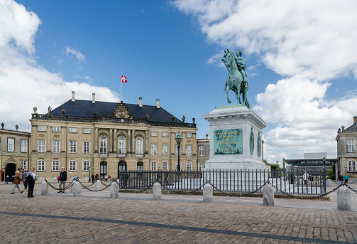 Monumental equestrian statue of King Frederick V and Amalienborg Palace in the city of Copenhagen, Denmark