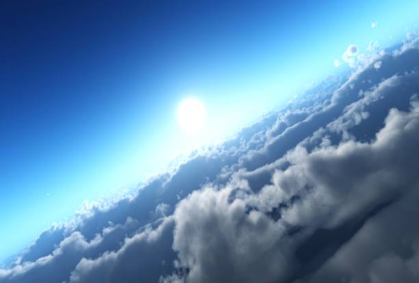 istock Flying above the clouds, clouds view from above, the sun above the clouds 1249008624
