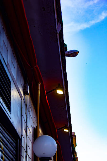 istock Store building line with a blue sky 1249012062