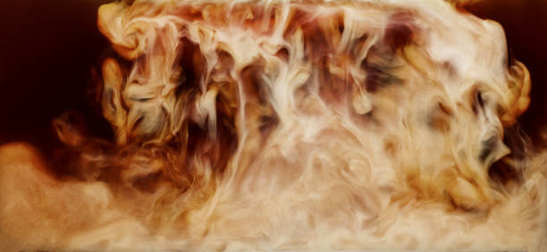 istock Closeup mixing of milk with coffee 1249012135