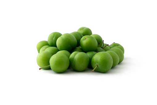Greengage plums isolated on white background