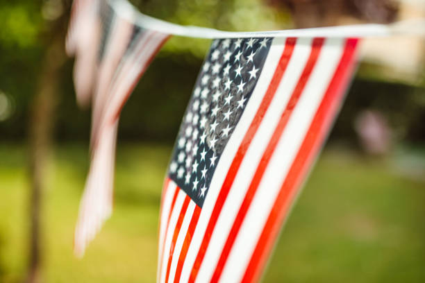 istock us flags pennant outdoors 1249016407