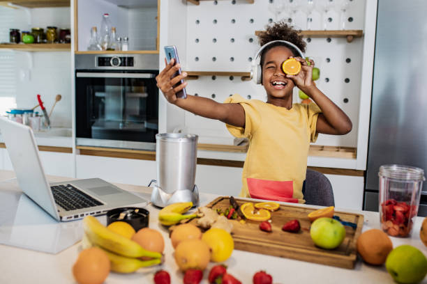 istock Young girl having fun in the kitchen 1249016530