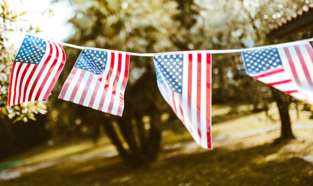 istock us flags pennant outdoors 1249016568