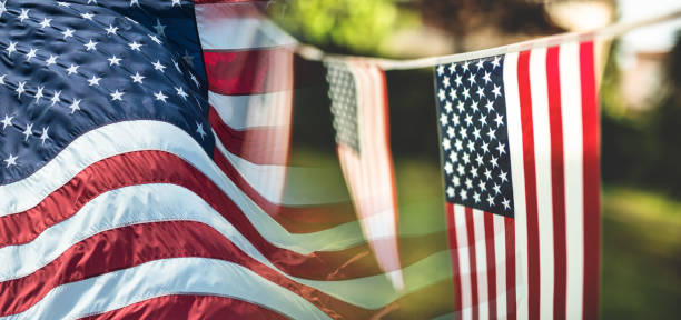 istock us flags pennant outdoors 1249016591