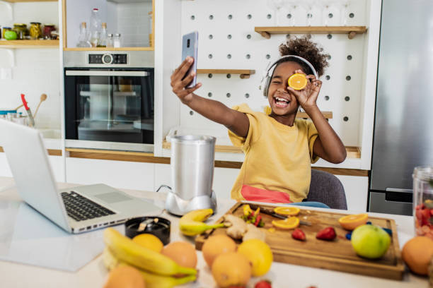 istock Young girl having fun in the kitchen 1249016682