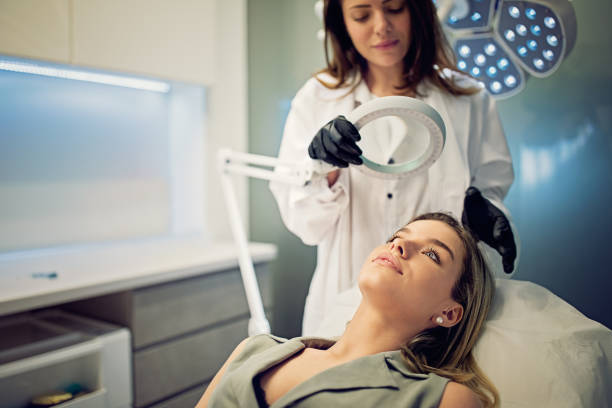 istock Young woman on beauty treatment procedure 1249018252
