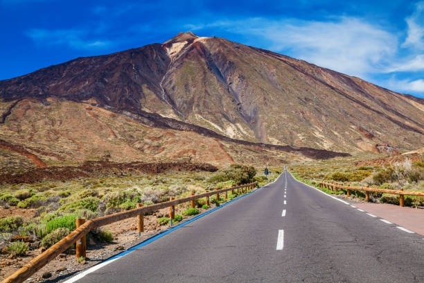 istock asphalt road to the volcano Teide 1249019213