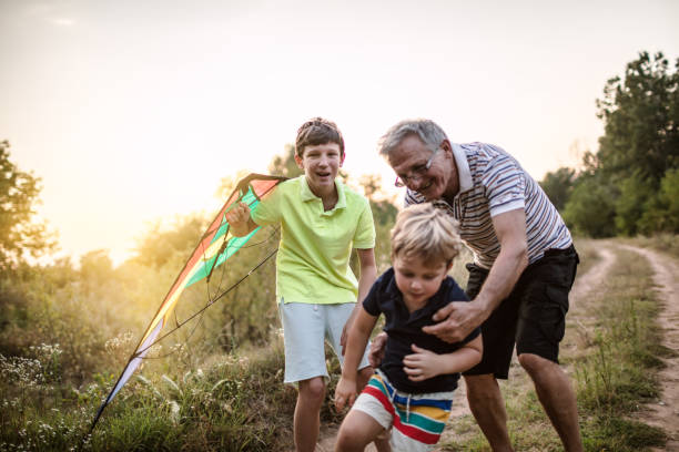 istock Happy Grandpa with his boys 1249019711