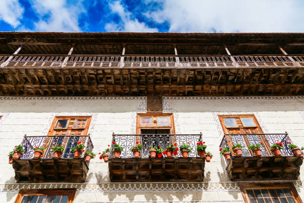 beautiful wooden old balconies with flower pots in La Orotava in Tenerife, Canary Islands, Spain