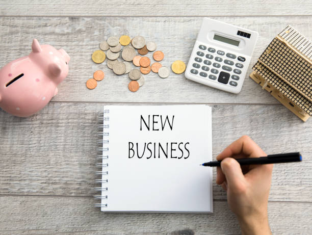istock man written new business text 1249023410