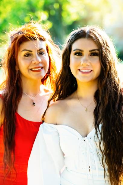 istock Hispanic mother and daughter posing looking at the camera smiling 1249023603