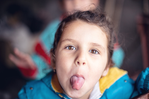 Girl sticking out tongue