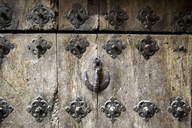 istock Lock on wooden door 1249026331