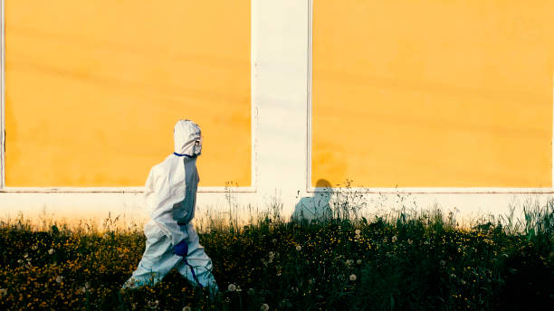 istock Man in protective COVID costume 1249027756