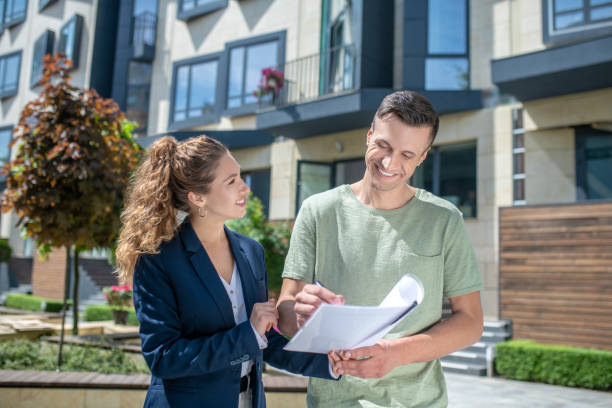 istock Female broker explaining contract terms to the client 1249049508