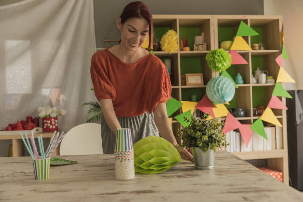 istock Decorating her place for a special party 1249063517
