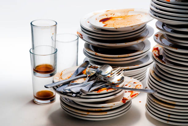 istock Dirty dishes isolated on White. 1249074267
