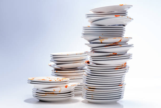 istock Pile of dirty dishes. 1249074277