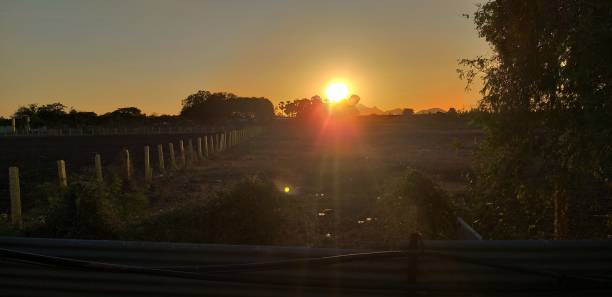 istock A yellow, red and dark black colored sunset is happening. 1249080262