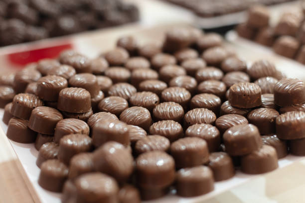 istock Display trays with different types of chocolates 1249089859