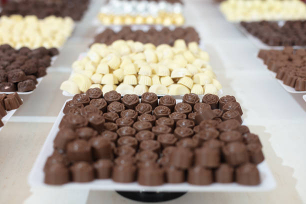 istock Display trays with different types of chocolates at chocolate store 1249089874