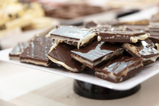 istock Display trays with different types of chocolates 1249090031