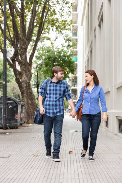 istock Couple walking outdoors 1249090107
