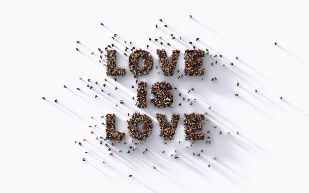 istock Love Is Love Slogan Written by Human Crowd on White Background 1249090631