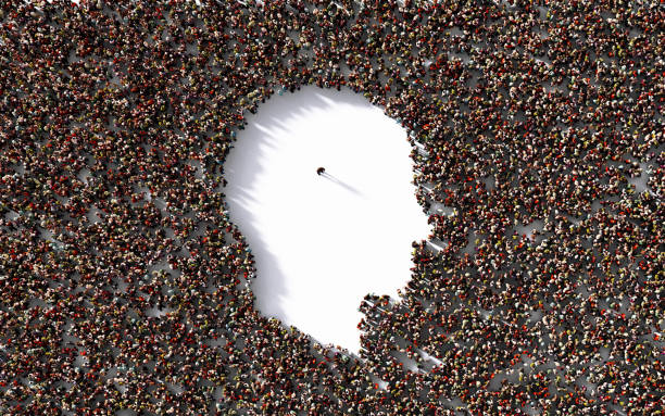 istock Single Man Standing Inside of A Human Head Shape Which Is Formed  by Human Crowd on White Background 1249090879
