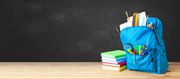istock School bag. Backpack with supplies for school 1249090930