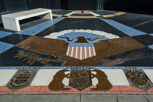 Monument plaza floor at Hoover Dam, on the Colorado River, built 1931 to 1935, Nevada, Mojave Desert. Hoover Dam memorial star map floor, center area. The star map marks the position of the stars as seen from the site of the Hoover Dam on the day it was completed. Sculpture is the work of Norwegian-born, naturalized American Oskar J.W. Hansen. Hansen's principal work at Hoover Dam is the monument of dedication on the Nevada side of the dam done for the US Bureau of Reclamation.