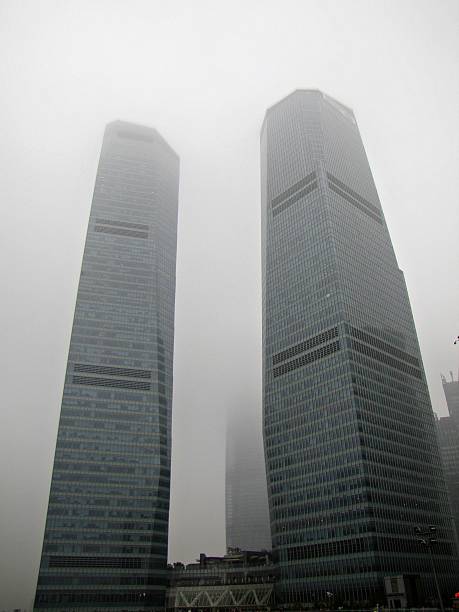 istock Skyscraper covered with rain and fog (Shanghai) 1249092914