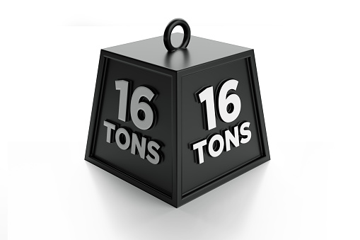 16 tons weight made of iron on white  background. Horizontal composition with clipping path and copy space. High angle view.