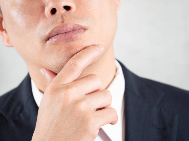 istock Male businessman thinking about beard hair removal 1249097543