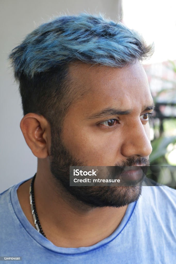Image Of Handsome Hindu Man With Blue Hair In Early 20s Side Profile Smiling Short Beard Dyed Bleached Messy Electric Blue Coloured Hair Closeup Portrait Of Good Looking Guy In Blue Tshirt Image Of Handsome Hindu Man With Blue Hair In Early 20s Side Profile Smiling Short Beard Dyed Bleached Messy Electric Blue Coloured Hair Closeup Portrait Of Good Looking Guy In Blue Tshirt