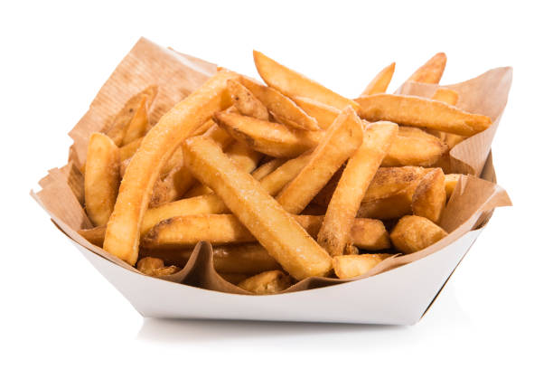 istock French fries with salt isolated on white 1249109764